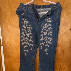 Embellished Dark Blue Boot Cut Women’s Jeans with Floral Rhinestone Detail